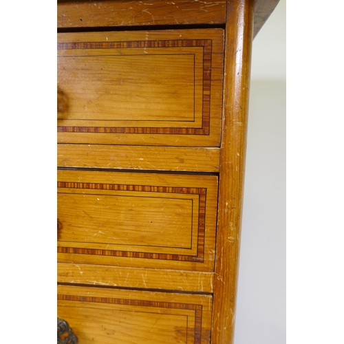 1001 - A Victorian polished pine chest of drawers with original painted decoration, four over four drawers ... 