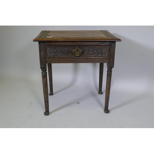 1008 - A Georgian oak single drawer side table with carved, raised on turned supports with pad feet, 66 x 4... 