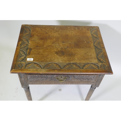 1008 - A Georgian oak single drawer side table with carved, raised on turned supports with pad feet, 66 x 4... 