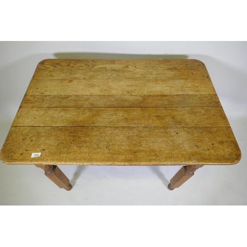 1009 - An antique continental oak plank top table, raised on reeded supports, 103 x 74 x 74cm