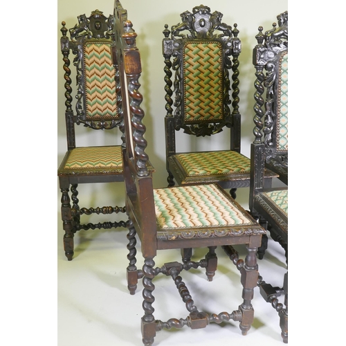 1012 - A set of five Jacobean style carved oak highback chairs