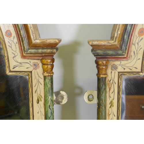 1013 - A pair of dome top wall mirrors with painted decoration and faux marble columns, 81 x 55cm