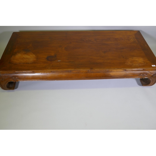 1016 - An antique Chinese hardwood low/opium table, 190 x 84cm