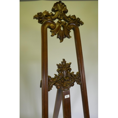 1017 - A carved mahogany adjustable easel, 220cm high