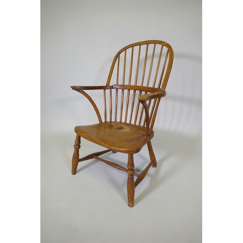 1020 - A C19th Windsor hoop back armchair with elm seat, reduced, 86cm high