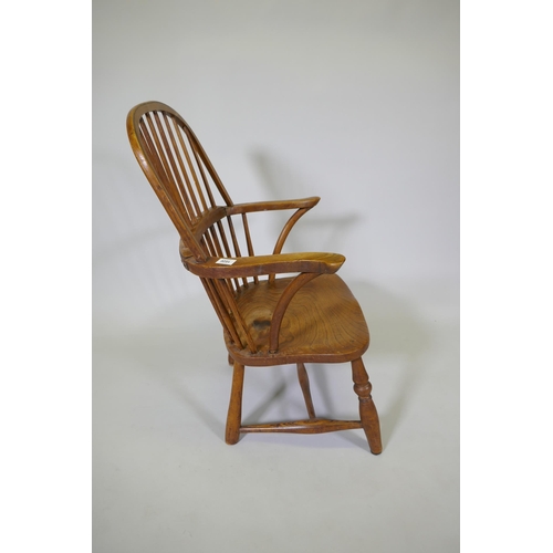 1020 - A C19th Windsor hoop back armchair with elm seat, reduced, 86cm high