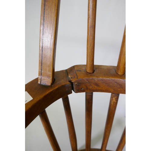 1020 - A C19th Windsor hoop back armchair with elm seat, reduced, 86cm high