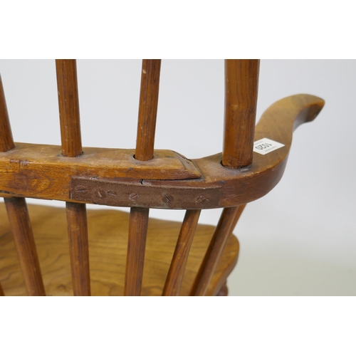 1020 - A C19th Windsor hoop back armchair with elm seat, reduced, 86cm high