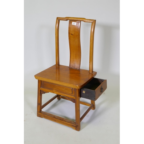 1021 - A Chinese elm low chair with single side drawer to the seat, 79cm high