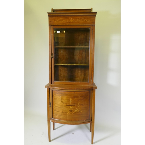 1024 - A Victorian inlaid mahogany bow front display cabinet raised on tapering supports, 67 x 45cm, 183cm ... 