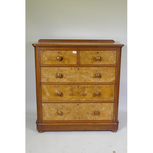 1029 - A Victorian walnut chest of two and three drawers with rounded ends, raised on bun supports, 102 x 5... 