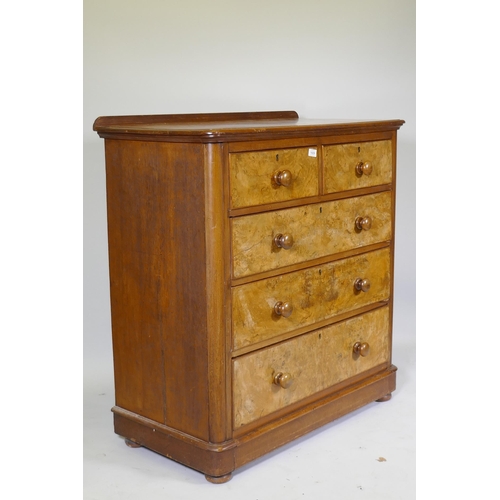 1029 - A Victorian walnut chest of two and three drawers with rounded ends, raised on bun supports, 102 x 5... 