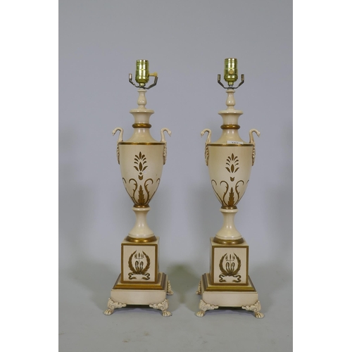 103 - A pair of Empire style painted wood urn shaped table lamps with gilt decoration, 63cm high