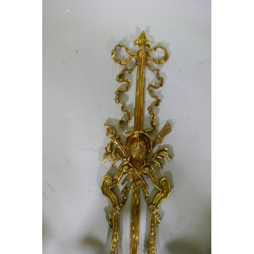 1034 - A pair of ormolu five branch sconces decorated with swags, masks and torches etc 119cm 