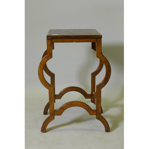 1037 - A continental mahogany lamp table, raised on shaped supports, 35 x 38 x 67cm