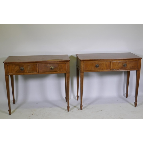 1042 - A pair of mahogany two drawer side tables on tapered and fluted legs, 91 x 46cm, 78cm high