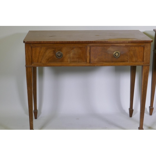 1042 - A pair of mahogany two drawer side tables on tapered and fluted legs, 91 x 46cm, 78cm high