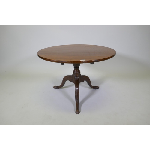 1050 - An antique mahogany tilt top table on tripod supports, reduced, 53cm high x 76cm diameter