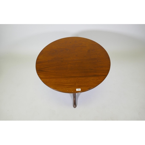 1050 - An antique mahogany tilt top table on tripod supports, reduced, 53cm high x 76cm diameter