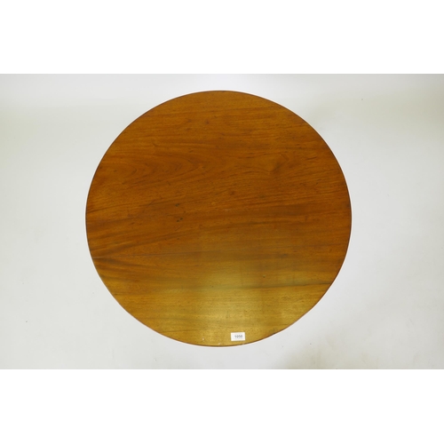 1050 - An antique mahogany tilt top table on tripod supports, reduced, 53cm high x 76cm diameter