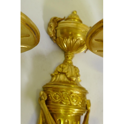 1051 - A pair of ormolu Louis XVI style three branch wall sconces, 66cm