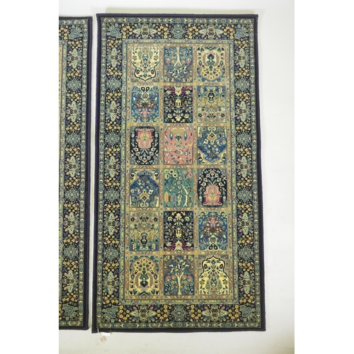 1053 - A pair of dark blue deep pile fine woven Persian runners with traditional panel designs, 85 x 160cm