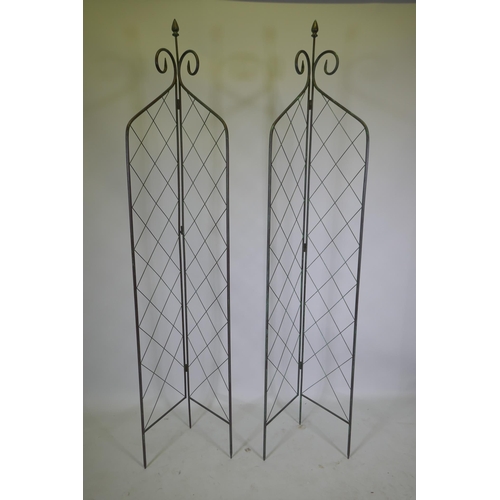 1054 - A pair of folding metal plant towers, 212cm high