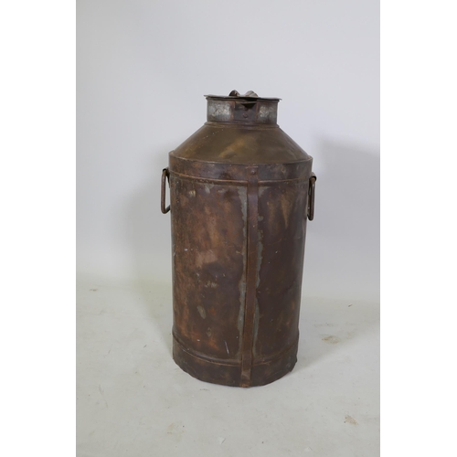 1055 - A vintage galvanised metal milk churn, 65cm high