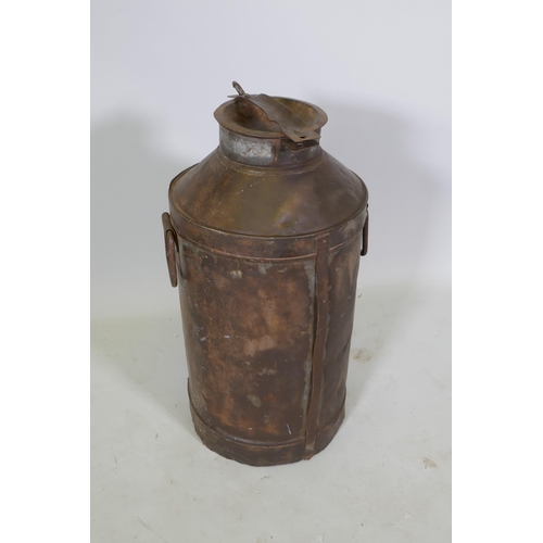 1055 - A vintage galvanised metal milk churn, 65cm high