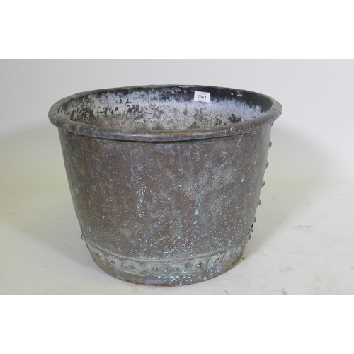 1061 - An antique copper jardiniere/planter of rivetted construction, 42cm diameter x 30cm high