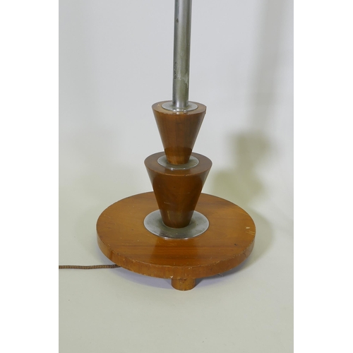 1073 - A mid-century umbrella stand and a mid-century walnut and chrome standard lamp, 158cm high