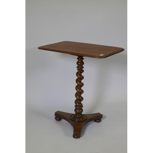 1075 - A C19th mahogany occasional table raised on a barleytwist column and platform base, with bun feet, 6... 