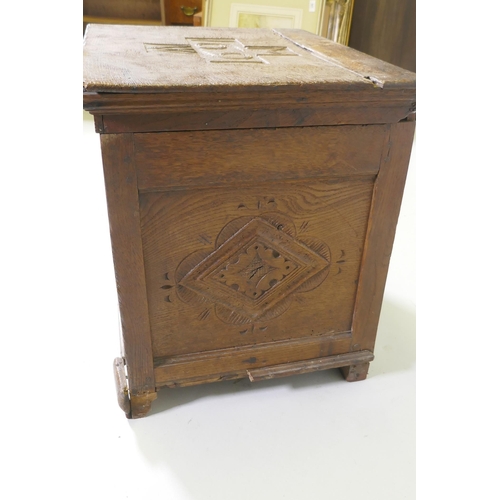 1083 - A C17th oak spice chest/coffer with carved panels, the cover dated 1691 and initialled MW, rear foot... 