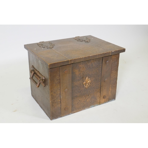 1085 - An Arts and Crafts copper bound coal box with two handles, 50 x 37cm