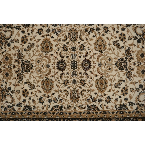 1086 - A Belgian cream ground rug with Oriental allover floral design and black borders, 150 x 212cm