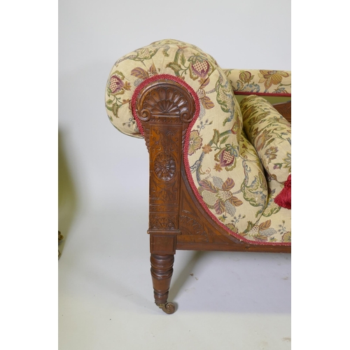 1093 - A Victorian walnut chaise longue with carved Grecian style decoration and good upholstery, 180cm lon... 