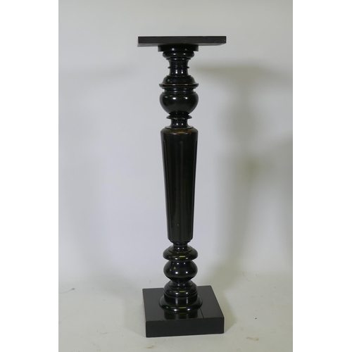 1096 - A Victorian ebonised jardiniere stand, raised  on a fluted tapering column, 96cm high