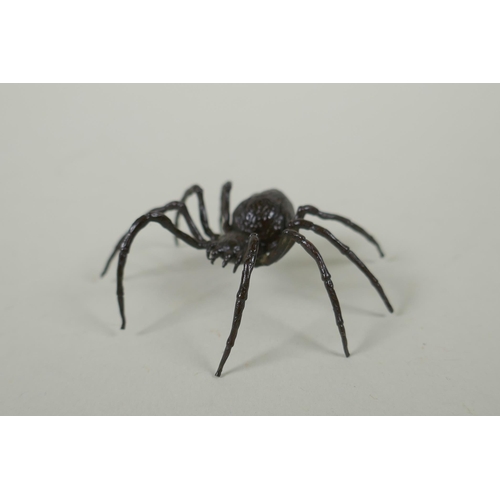 110 - A Japanese style bronze okimono spider, 7cm wide