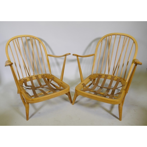 1101 - A pair of 1970s Ercol beech and elm Model 203 Windsor armchairs, with original upholstered cushions