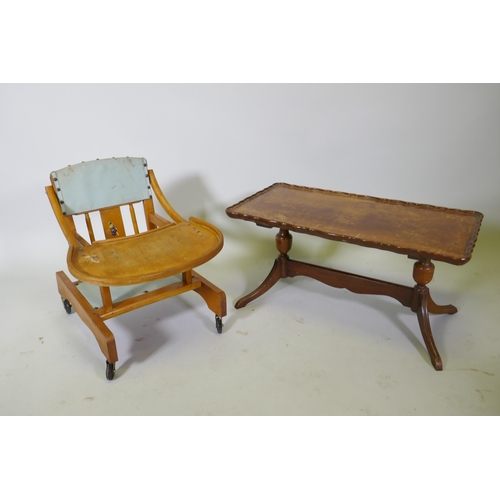 1102 - A vintage child's baby walker, and a coffee table by Shaw of London