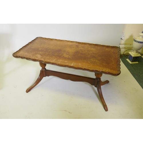 1102 - A vintage child's baby walker, and a coffee table by Shaw of London