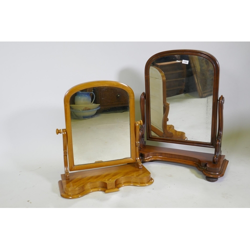 1108 - A Victorian mahogany arched top swing toilet mirror, 79cm high, and a similar in satin birch