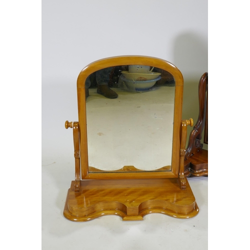 1108 - A Victorian mahogany arched top swing toilet mirror, 79cm high, and a similar in satin birch