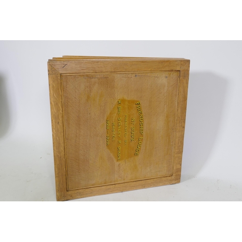 1110 - A Masonic tracing board c.1930 of four oak panels, with hand painted decoration, inset label, Toye &... 