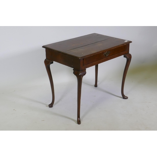 1112 - A small Georgian oak side table, with moulded edge top, and single drawer, raised on cabriole suppor... 