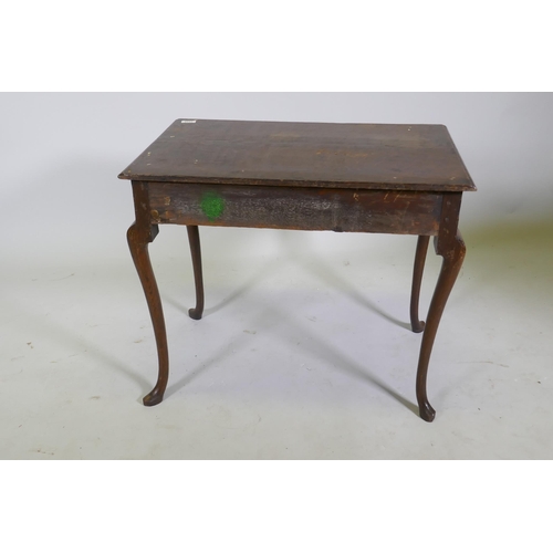 1112 - A small Georgian oak side table, with moulded edge top, and single drawer, raised on cabriole suppor... 