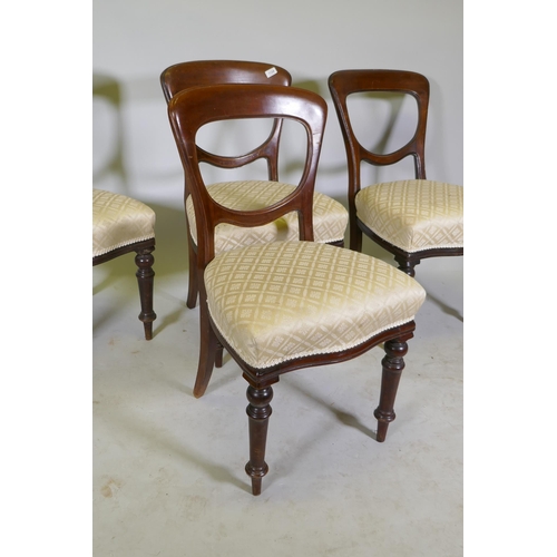 1124 - Set of four Victorian mahogany balloon back dining chairs, raised on turned supports