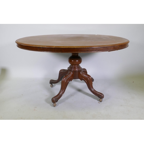 1125 - A Victorian mahogany tilt top loo table, raised on a turned column and cabriole supports, 132 x 100 ... 