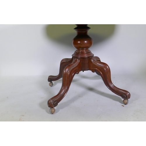 1125 - A Victorian mahogany tilt top loo table, raised on a turned column and cabriole supports, 132 x 100 ... 