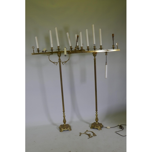 1127 - A Judaica pair of brass Menorah candlesticks, AF, 175cm high